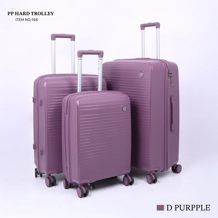 Set of three purple hard shell trolley suitcases with wheels and telescopic handles on white background