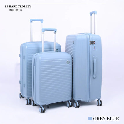 Set of three grey blue hard shell suitcases with wheels and telescopic handles