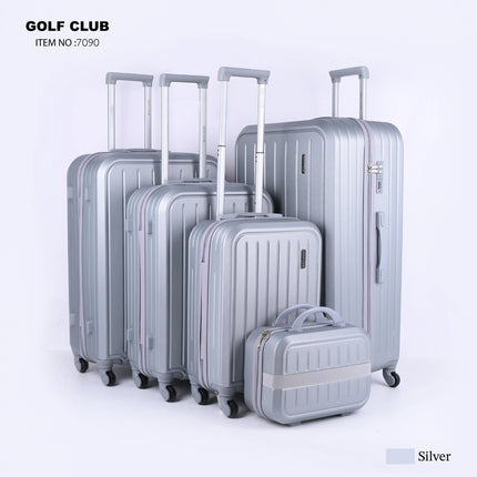 Set of five silver hard shell suitcases with wheels and telescopic handles, upright on white background.