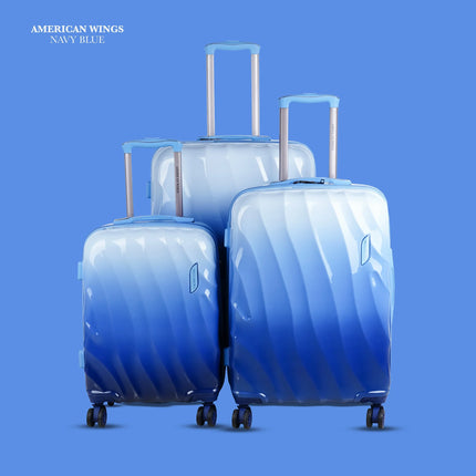 Set of three navy blue hardshell suitcases with telescopic handles and spinner wheels