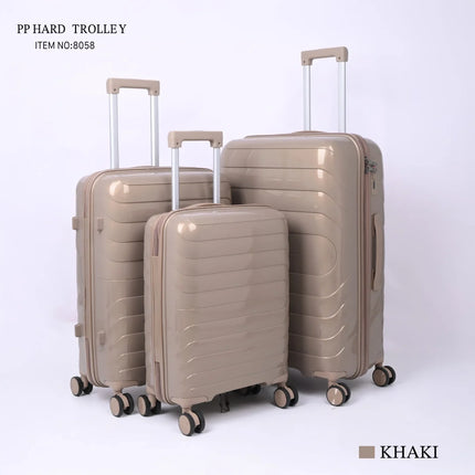Set of three khaki hard shell trolley suitcases with spinner wheels on white background