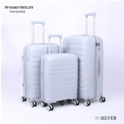 Set of three silver hard shell trolley suitcases with wheels and telescopic handles
