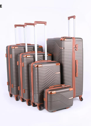 Set of five brown hard-shell suitcases with wheels and telescopic handles, various sizes