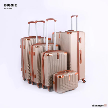 Set of five champagne-colored hard-shell suitcases with wheels and telescopic handles