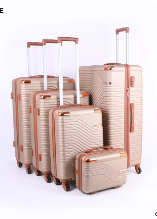 Set of five champagne hard-shell suitcases with telescopic handles and spinner wheels