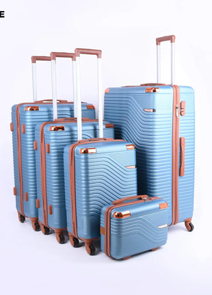 Set of five light blue hard-shell suitcases with brown accents and wheels