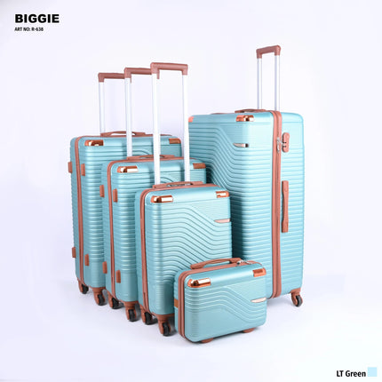 Set of five light green hard shell suitcases with wheels and brown handles, upright on white background.