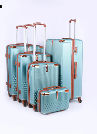 Light green hard shell luggage set with brown handles and wheels, five suitcases on white background