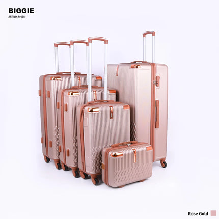 Rose gold hard shell luggage set with telescopic handles and wheels, five pieces displayed